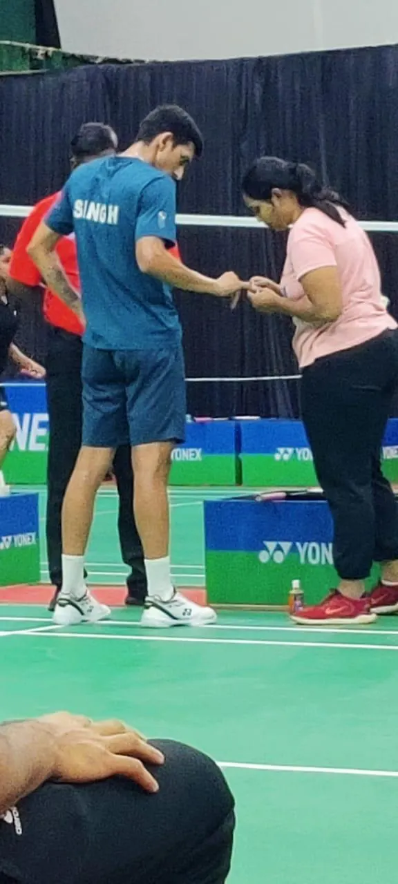 Courtside physiotherapy at a badminton tournament