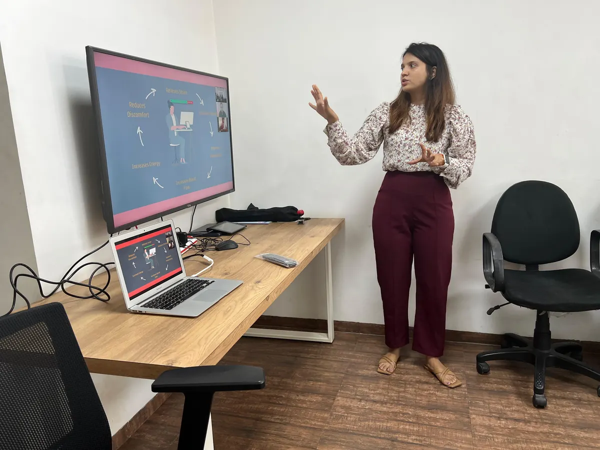 Dr. Tejaswini presenting at a workplace health session